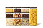 Full Naked Kitchen 20-piece glass countertop set with black lids holding pantry staples including pasta, grains, nuts and coffee