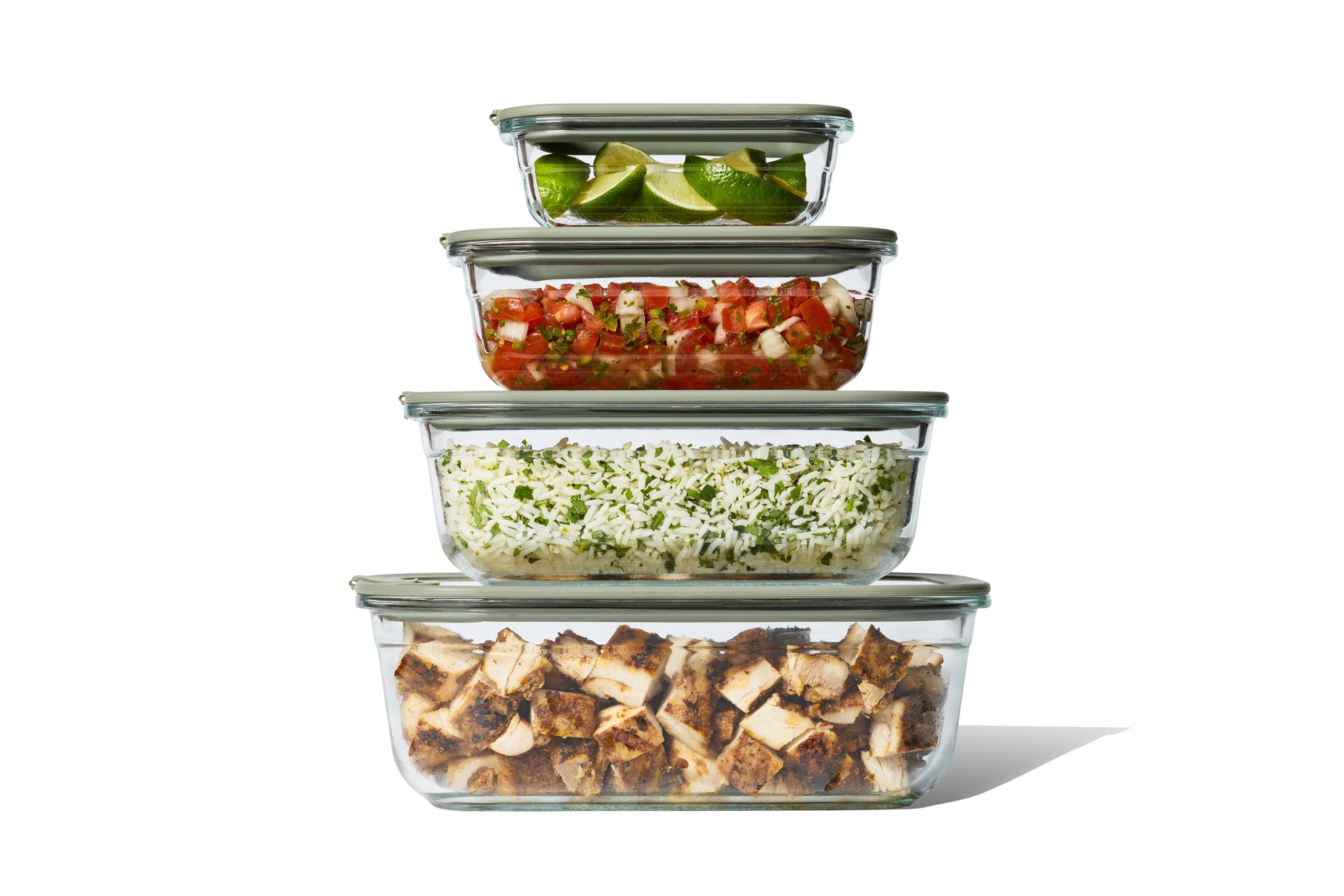 Set of Naked Kitchen glass food storage containers with lids on a white background
